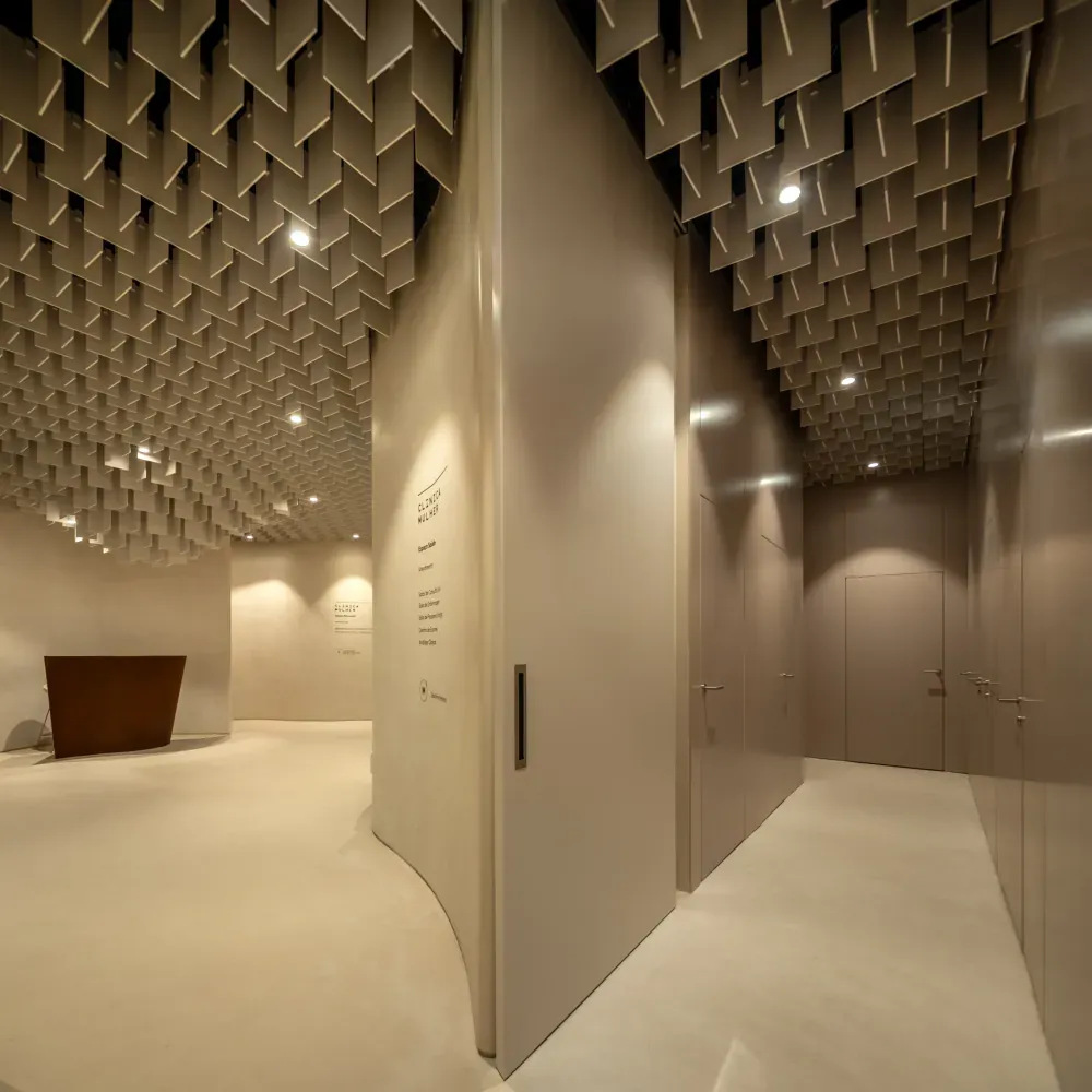 Curved walls screening the reception area