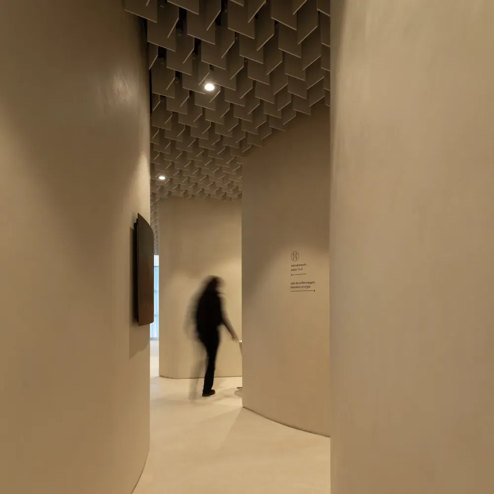 Secluded corridor between curved walls